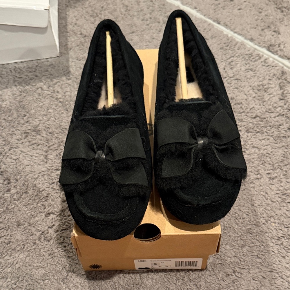 UGG Black Moccasins with Bow Accent